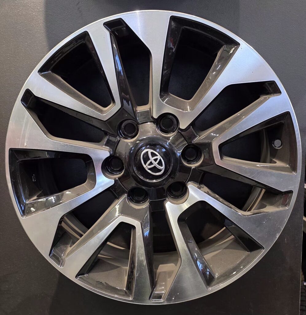 Shiny alloy wheel with Toyota logo