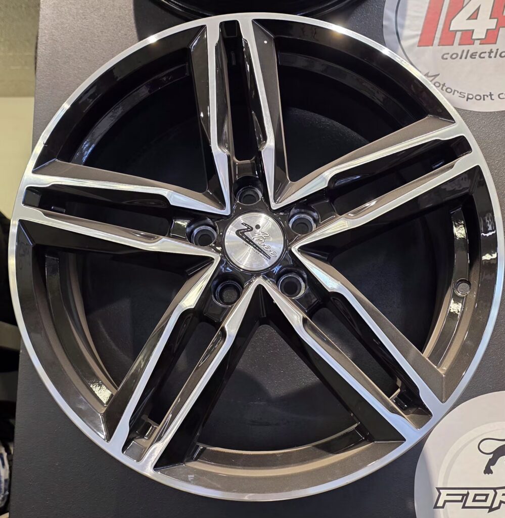 Stylish alloy wheel with spokes