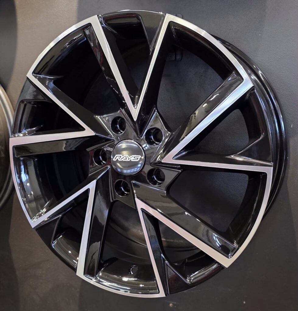 Black alloy wheel with shiny accents